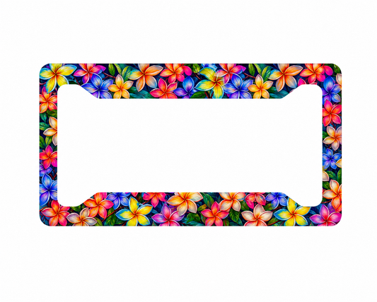 Colorful Hawaiian plumeria floral aluminum license plate frame centered on a white background with generous marketplace-safe padding.