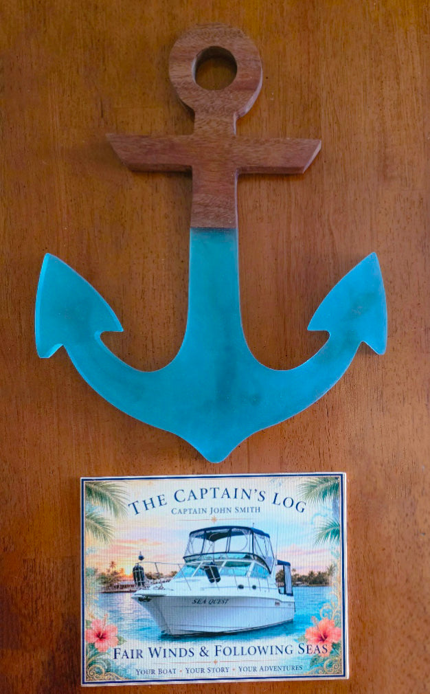 Finished personalized captain log wall hanging with mahogany and blue resin anchor above a custom boat canvas
